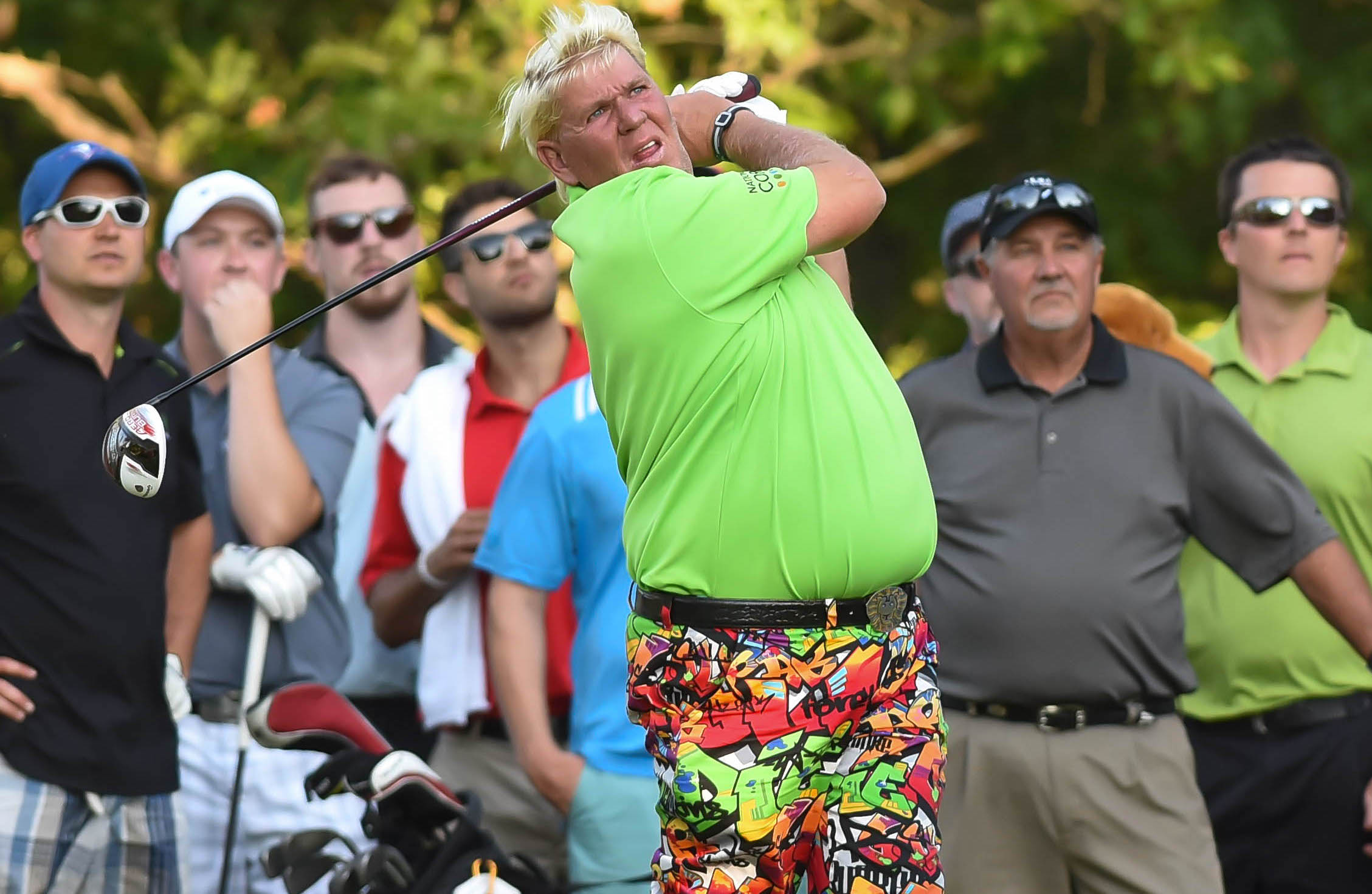 John Daly taking a swing on golf course